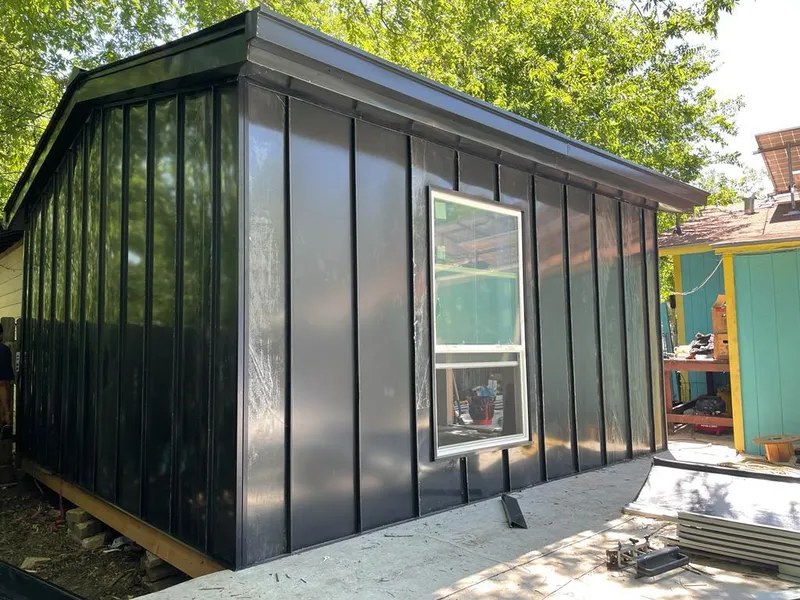 Black standing seam metal wall panels for Metal Roof Installation in Montgomery